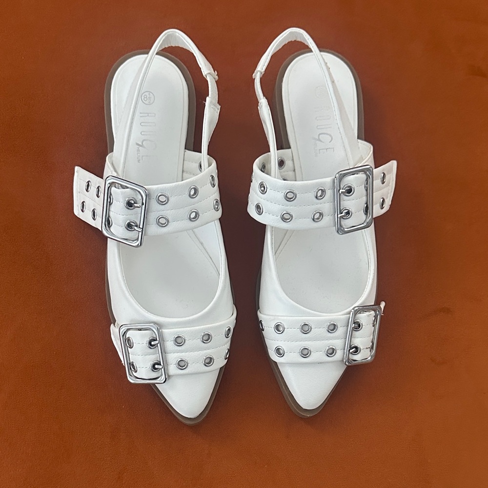 White buckle flats